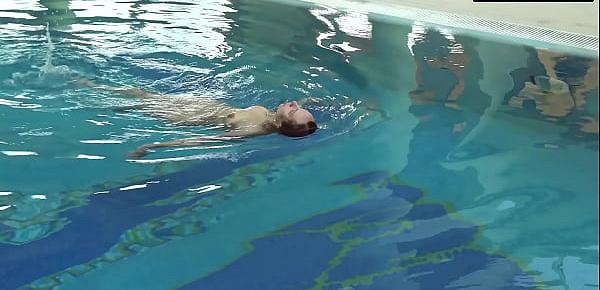  Brunette big tits babe Mia Ferrari swims in the pool